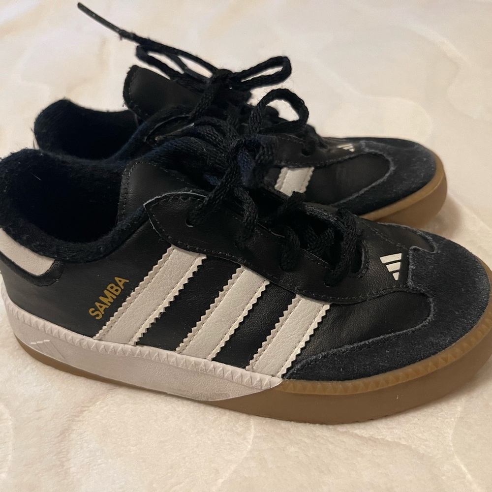 Adidas Black and White Sneakers with Iconic Stripes